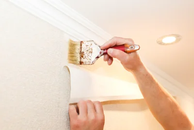 Pose de papier peint à Massels — revêtements muraux et toiles de verre